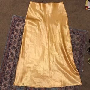 Satin mid length yellow skirt - size small